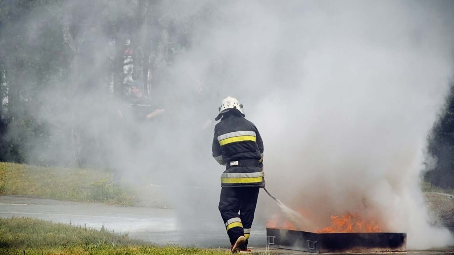 firefighter putting out a fire