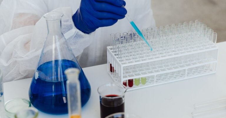 Technician testing low-level PFAS in municipal wastewater for compliance